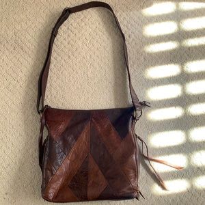 Leather purse with adjustable strap